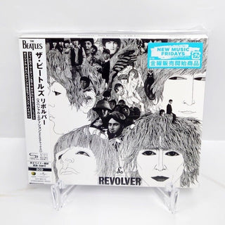 the album cover for The Beatles - Revolver - Special Edition Deluxe - SHM-CD