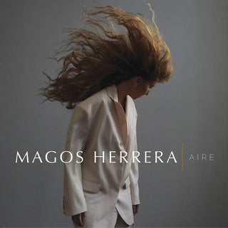 the album cover for Magos Herrera - Aire