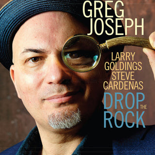 the album cover for Greg Joseph - Drop The Rock