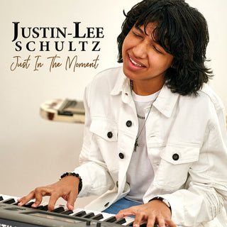 the album cover for Justin Schultz  Lee - Just In The Moment