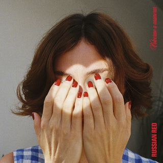 the album cover for Russian Red - Volverme A Enamorar