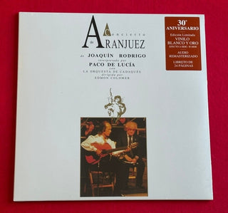 the album cover for De Lucia, Paco - Concierto De Aranjuez - 30th Anniversary - White & Gold Vinyl