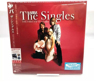 the album cover for ABBA - The Singles - Deluxe Edition - SHM / Paper Sleeve