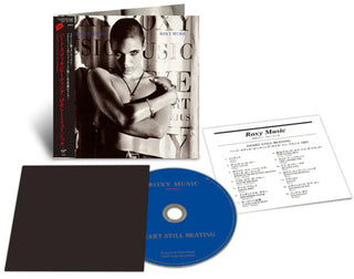 the album cover for Roxy Music - Heart Still Beating (Shm) (Can)
