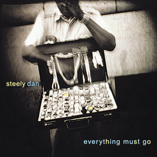the album cover for Steely Dan - Everything Must Go [Clear Vinyl]