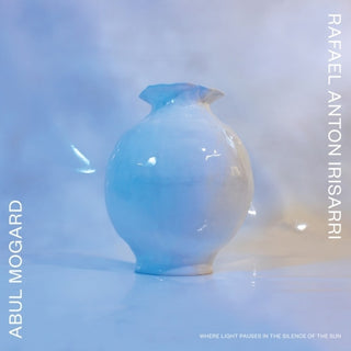 the album cover for Abul Mogard  / Rafael Anton Irisarri - Where Light Pauses In The Silence Of The Sun (Wht)
