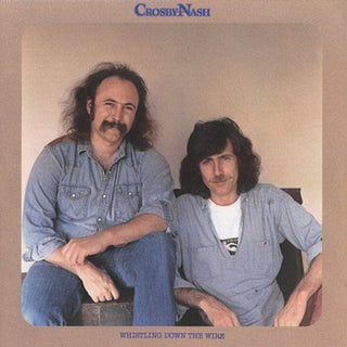 the album cover for Crosby & Nash - Whistling Down The Wire [Remastered]