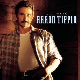 the album cover for Aaron Tippin - Ultimate Aaron Tippin
