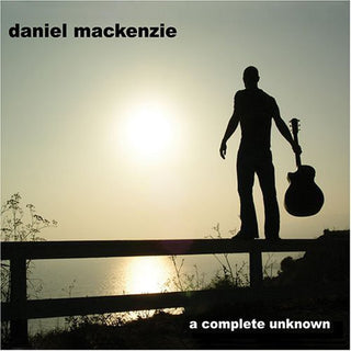 the album cover for Daniel Mackenzie - A Complete Unknown