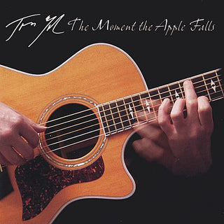 the album cover for Tom Yoder - Yoder, Tom : Moment the Apple Falls