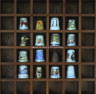 the album cover for Iron And Wine - Woman King