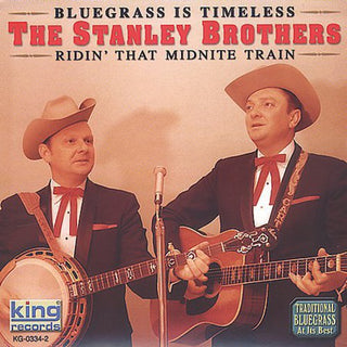 the album cover for Stanley Brothers - Ridin That Midnight Train