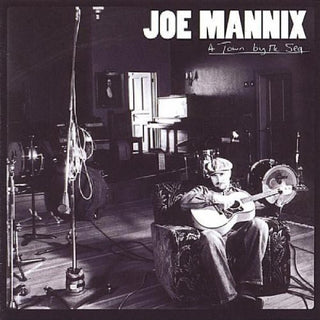 the album cover for Joe Mannix - Town By the Sea