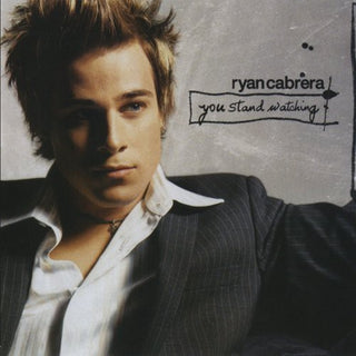 the album cover for Ryan Cabrera - You Stand Watching