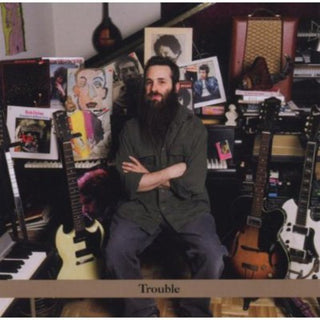 the album cover for Jamie Saft - Trouble: The Jamie Saft Trio Plays Bob Dylan