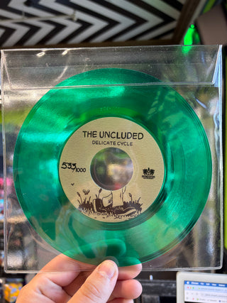 The Uncluded- Delicate Cycle (Green Translucent 7", #533/#1000)