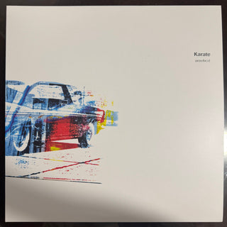 Karate- Unsolved: Y2K 25th Anniversary - 180-Gram Coke Bottle Clear Vinyl