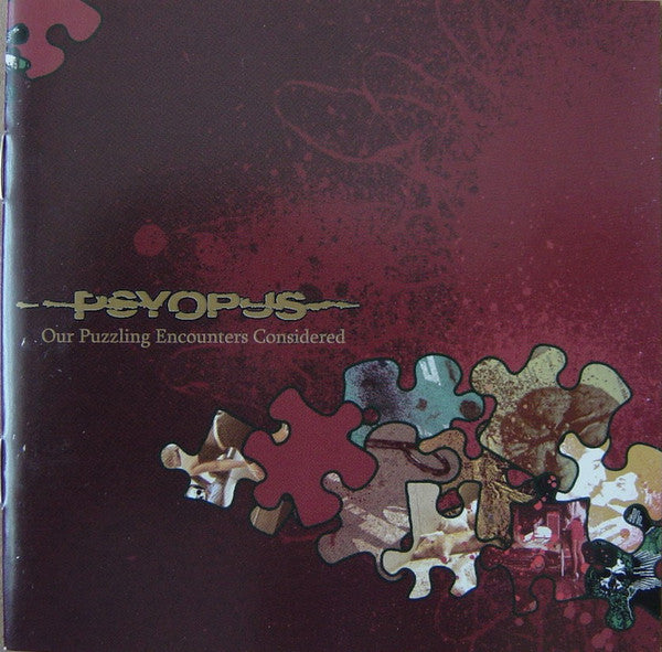 Psyopus- Our Puzzling Encounters Considered (Gold Transparent/ Ultra Clear W/ Red Splatter Split) - Darkside Records